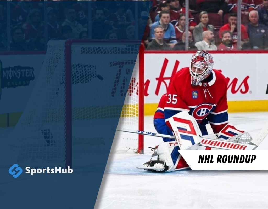 A goaltender in a red Canadiens jersey crouches in front of the net during a hockey game, ready to block a shot.